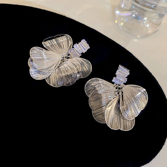 Silver Needle Zircon Hollow Petal Earrings